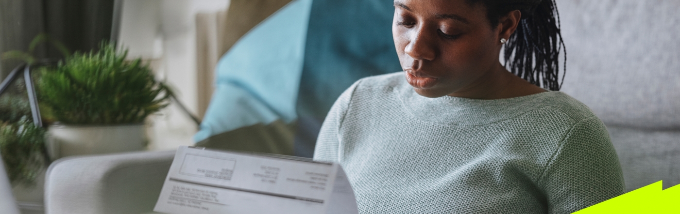 Woman reading invoice